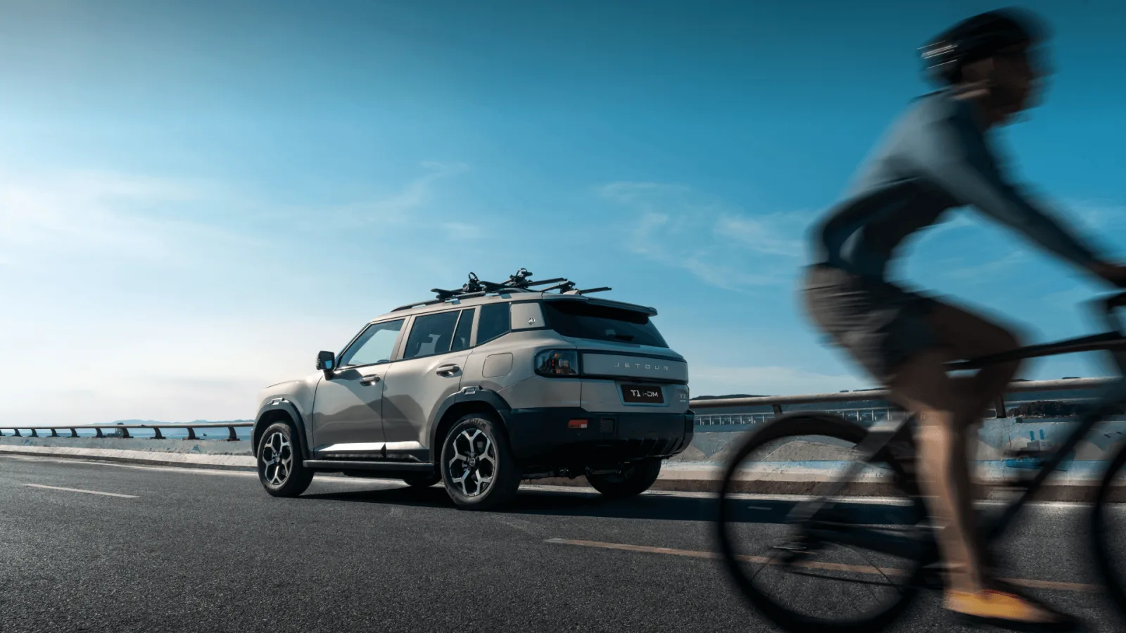 Jetour T1 i-DM on coastal bridge road